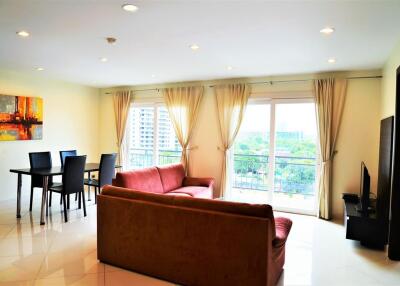 living room with large windows and city view