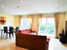 living room with large windows and city view