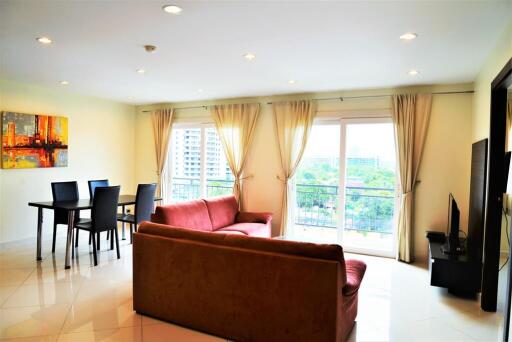 living room with large windows and city view