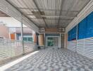 Covered garage with tiled flooring