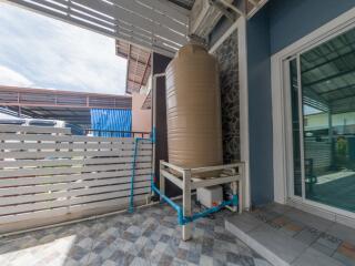 Outdoor area with water tank