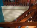 Wooden staircase with railing