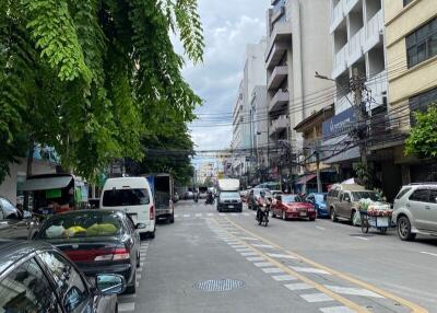 Street view of residential and commercial buildings