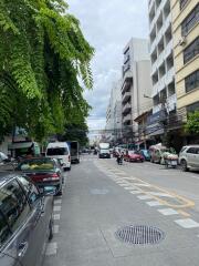 Street view of residential and commercial buildings