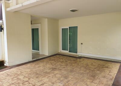 Covered patio with sliding glass doors