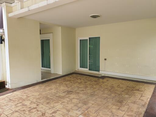 Covered patio with sliding glass doors