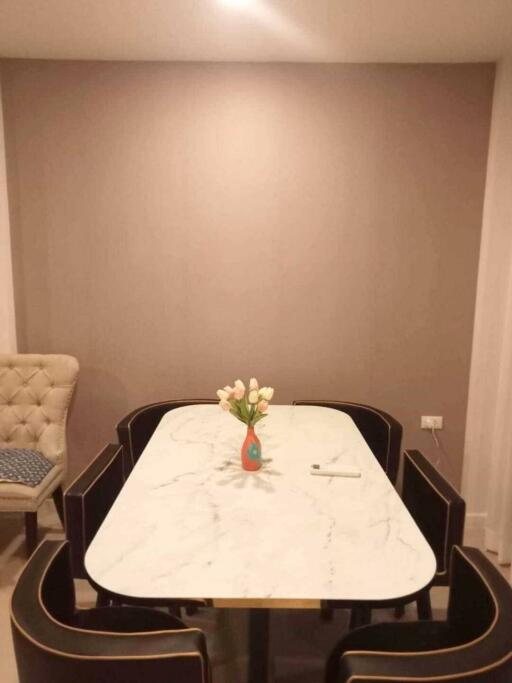 Dining area with table and chairs