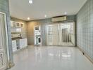 Pantry area with cabinets and air conditioning