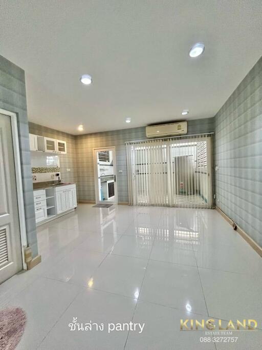 Pantry area with cabinets and air conditioning