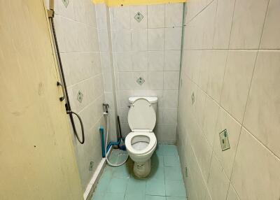 Bathroom with a toilet and a shower