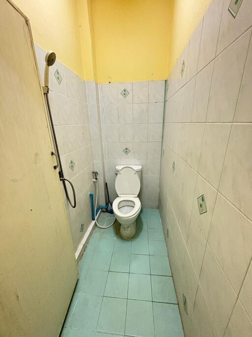 Bathroom with a toilet and a shower