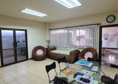 Office space with furniture and a glass table