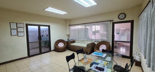 Office space with furniture and a glass table