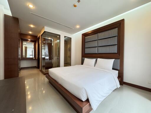 Master bedroom with modern furnishings and ensuite bathroom