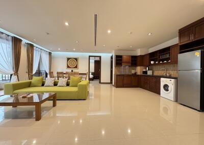 Spacious and modern living room with integrated kitchen