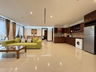 Spacious and modern living room with integrated kitchen