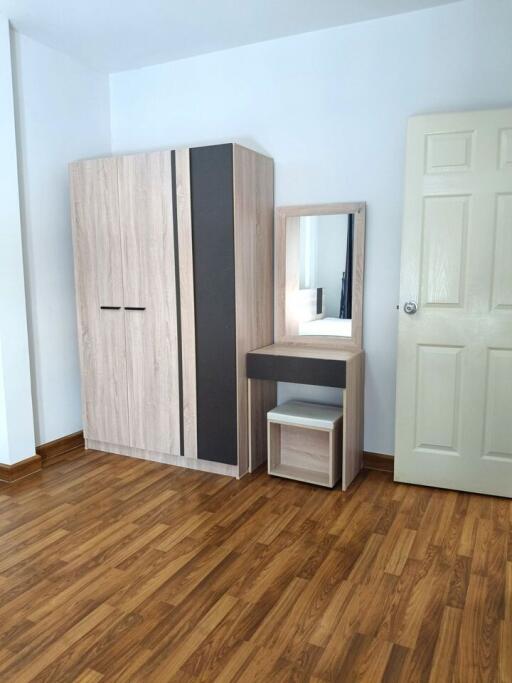 Bedroom with wardrobe and dressing table