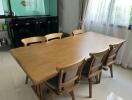 Dining room with fish tank and wooden table