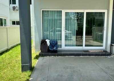 Front view of the house with sliding glass door