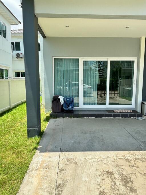 Front view of the house with sliding glass door