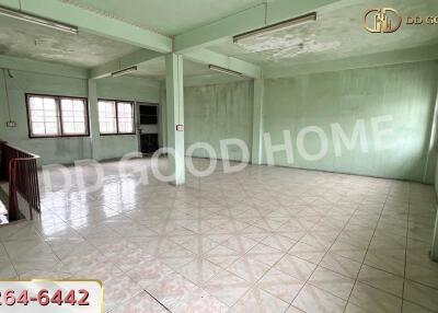 Spacious and well-lit living room with large windows