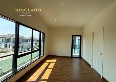 Spacious room with large windows and ample natural light