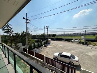 Balcony with view of street and surroundings