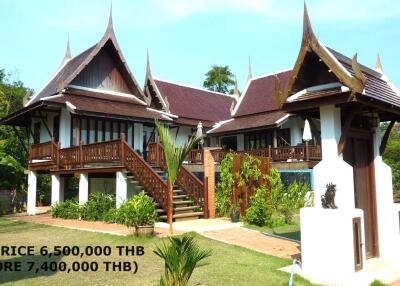 Traditional Thai-style house with garden