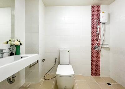 Well-lit bathroom with modern fixtures