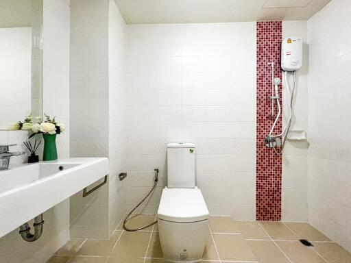 Well-lit bathroom with modern fixtures