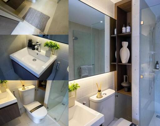 Modern bathroom with various amenities including a sink, toilet, shower, and shelving