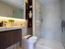 Modern bathroom with glass shower and vanity