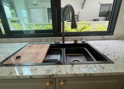 Modern kitchen sink with granite countertops