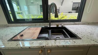 Modern kitchen sink with granite countertops