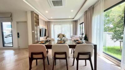 Modern dining room with large windows