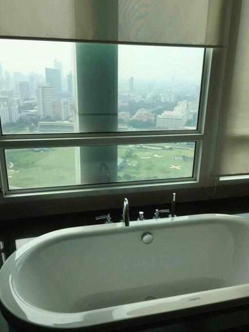 Bathroom with Tub and City View