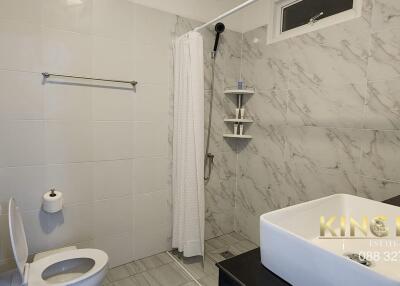 Modern bathroom with shower and toilet