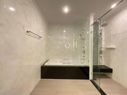 Modern bathroom with bathtub and shower