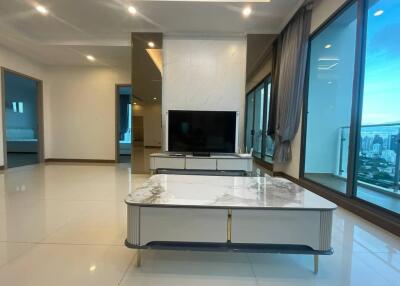 Modern living room with TV and marble coffee table