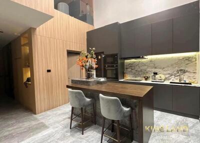 Modern kitchen with island and bar stools