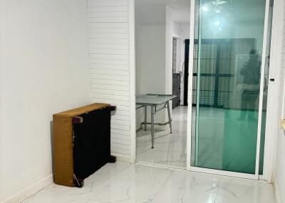 Living space with partition and sliding door