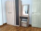 Bedroom with a wardrobe and dressing table