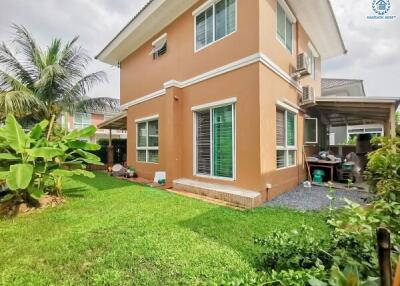 Exterior view of a house with a garden