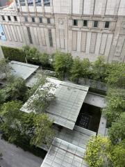 Building exterior with landscaped greenery