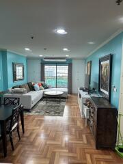 Spacious and well-lit living room with a view