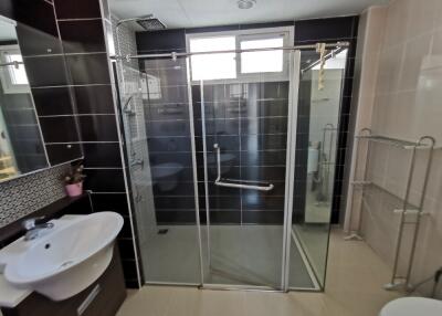 Modern bathroom with glass shower enclosure