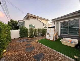 Outdoor area with garden and play structure