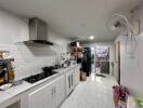 Modern kitchen with appliances and white cabinets