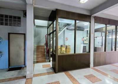 Office area with sink and stairs