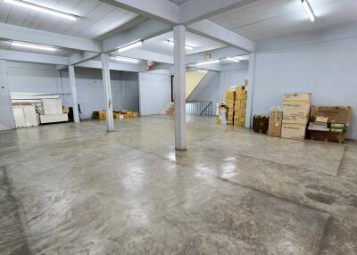 Spacious basement area with storage boxes